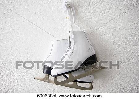 still life of pair of skates hanging on wall View Large Photo Image Stock Image - still life of pair of skates hanging on wall. Fotosearch