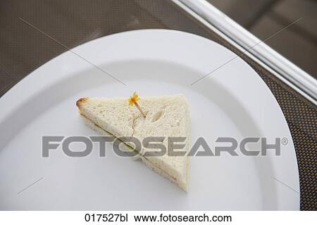 still life of piece of sandwich on plastic plate View Large Photo Image Stock Image - still life of piece of sandwich on plastic plate. Fotosearch