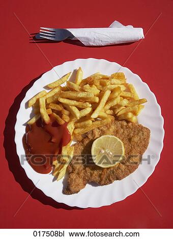 still life of plate with schnitzel chips and ketchup View Large Photo Image Stock Image - still life of plate with schnitzel chips and ketchup. Fotosearch