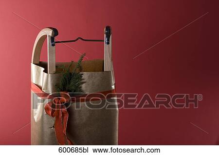still life of sledge wrapped as christmas present View Large Photo Image Stock Image - still life of sledge wrapped as christmas present. Fotosearch