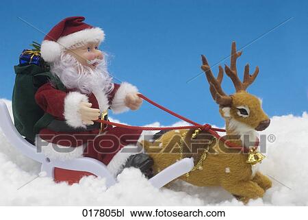 still life of toy santa claus with reindeer View Large Photo Image Stock Image - still life of toy santa claus with reindeer . Fotosearch