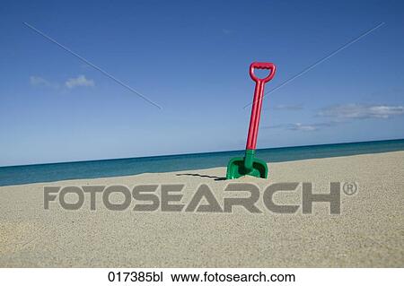 still life of toy shovel on beach View Large Photo Image Stock Image - still life of toy shovel on beach. Fotosearch