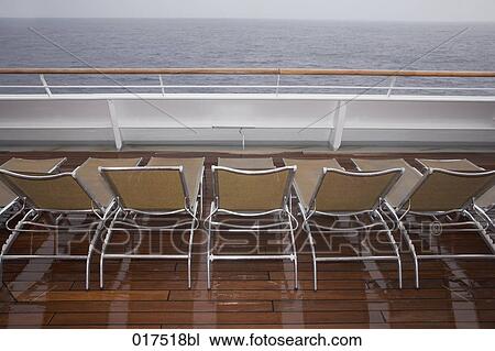 sunloungers on deck of cruise ship View Large Photo Image Stock Image - sunloungers on deck of cruise ship. Fotosearch
