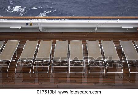 sunloungers on deck of cruise ship View Large Photo Image Stock Image - sunloungers on deck of cruise ship. Fotosearch