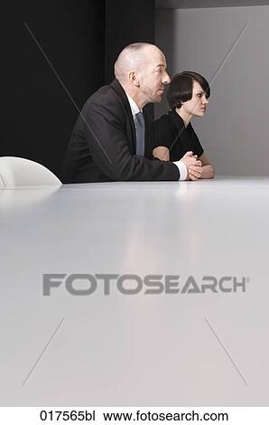 businessman and female colleague following meeting View Large Photo Image Stock Image - businessman and female colleague following meeting. Fotosearch