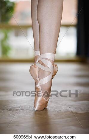 close-up of ballet dancer on tiptoes View Large Photo Image Stock Image - close-up of ballet dancer on tiptoes. Fotosearch
