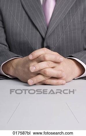 close-up of businessman´s folded hands View Large Photo Image Stock Image - close-up of businessman´s folded hands. Fotosearch