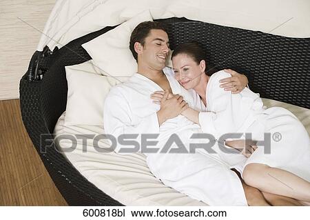 couple lying in close embrace View Large Photo Image Stock Image - couple lying in close embrace. Fotosearch
