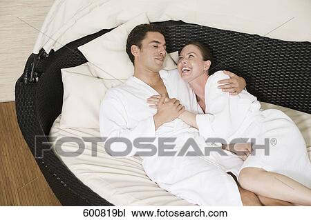 couple lying in close embrace View Large Photo Image Stock Image - couple lying in close embrace. Fotosearch