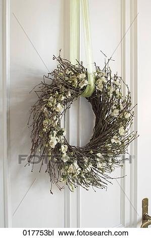 flower wreath hanging on door as decoration View Large Photo Image Stock Image - flower wreath hanging on door as decoration. Fotosearch