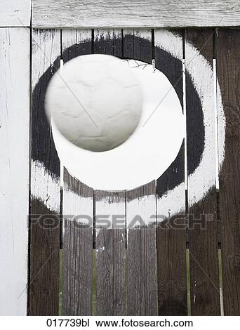 football flying through hole of practice goal View Large Photo Image Stock Image - football flying through hole of practice goal. Fotosearch