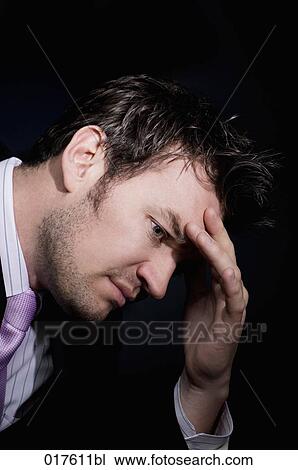 Stock Image - headshot of desperate businessman. Fotosearch