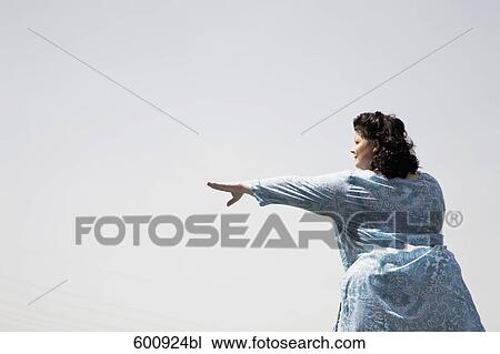 overweight woman doing tai chi View Large Photo Image Stock Image - overweight woman doing tai chi. Fotosearch