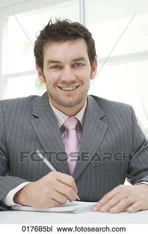 portrait of businessman making notes View Large Photo Image Stock Image - portrait of businessman making notes. Fotosearch