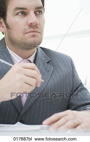 portrait of businessman making notes View Large Photo Image Stock Image - portrait of businessman making notes. Fotosearch
