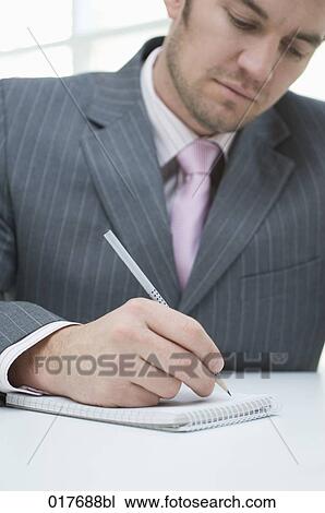 portrait of businessman making notes View Large Photo Image Stock Image - portrait of businessman making notes. Fotosearch