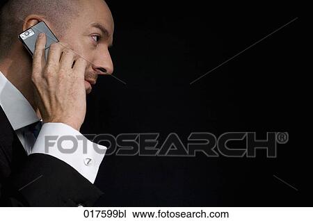 portrait of businessman with mobile phone View Large Photo Image Stock Image - portrait of businessman with mobile phone. Fotosearch