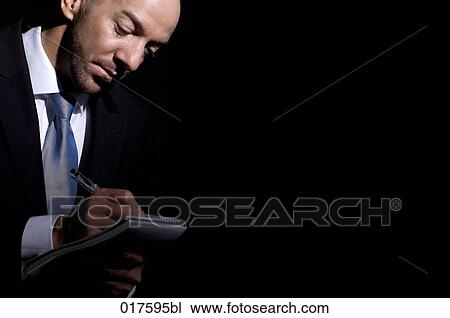 portrait of businessman with pen and writing pad View Large Photo Image Stock Image - portrait of businessman with pen and writing pad. Fotosearch