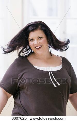 portrait of smiling overweight woman View Large Photo Image Stock Image - portrait of smiling overweight woman. Fotosearch