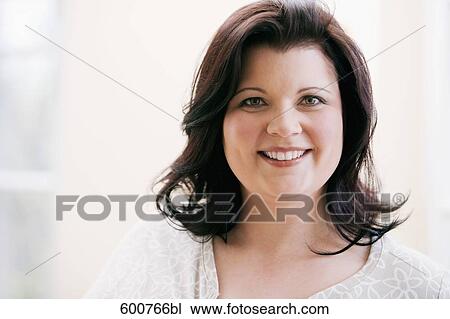 portrait of smiling overweight woman View Large Photo Image Stock Image - portrait of smiling overweight woman. Fotosearch
