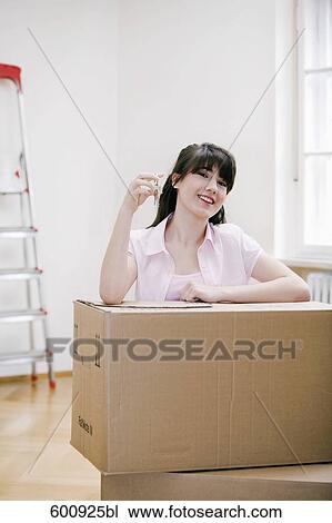 portrait of teenage girl in new home holding keys View Large Photo Image Stock Image - portrait of teenage girl in new home holding keys. Fotosearch