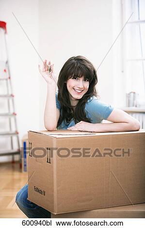 portrait of teenage girl in new home holding keys View Large Photo Image Stock Image - portrait of teenage girl in new home holding keys. Fotosearch