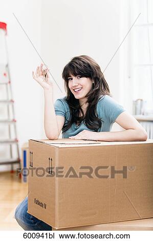 portrait of teenage girl in new home holding keys View Large Photo Image Stock Image - portrait of teenage girl in new home holding keys. Fotosearch