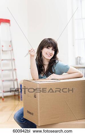portrait of teenage girl in new home holding keys View Large Photo Image Stock Image - portrait of teenage girl in new home holding keys. Fotosearch