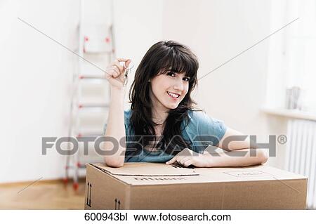portrait of teenage girl in new home holding keys View Large Photo Image Stock Image - portrait of teenage girl in new home holding keys. Fotosearch