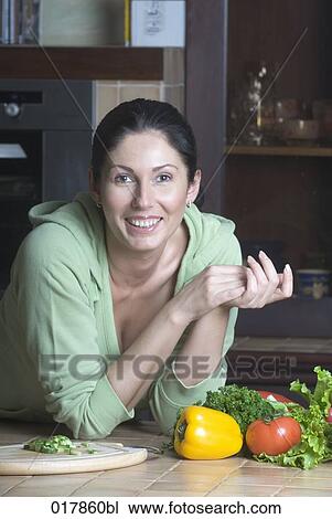 portrait of woman in kitchen View Large Photo Image Stock Image - portrait of woman in kitchen. Fotosearch