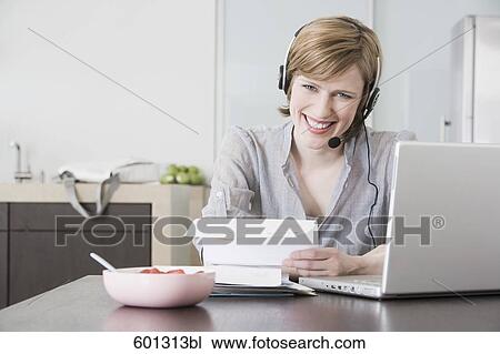portrait of woman working at home with laptop computer View Large Photo Image Stock Image - portrait of woman working at home with laptop computer. Fotosearch