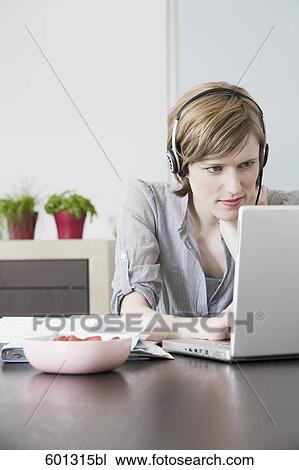portrait of woman working at home with laptop computer View Large Photo Image Stock Image - portrait of woman working at home with laptop computer. Fotosearch