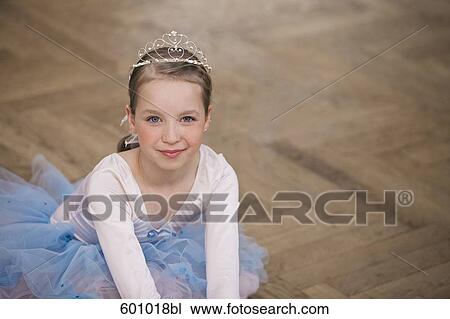 portrait of young ballet dancer sitting on floor View Large Photo Image Stock Image - portrait of young ballet dancer sitting on floor. Fotosearch