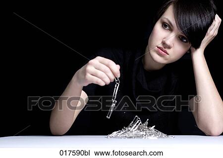 portrait of young businesswoman with paper clip chain View Large Photo Image Stock Image - portrait of young businesswoman with paper clip chain. Fotosearch