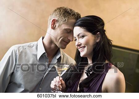 portrait of young couple in bar flirting with each other View Large Photo Image Stock Image - portrait of young couple in bar flirting with each other. Fotosearch
