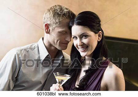 portrait of young couple in bar flirting with each other View Large Photo Image Stock Image - portrait of young couple in bar flirting with each other. Fotosearch