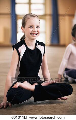 portrait of young girl doing meditation exercise View Large Photo Image Stock Image - portrait of young girl doing meditation exercise. Fotosearch
