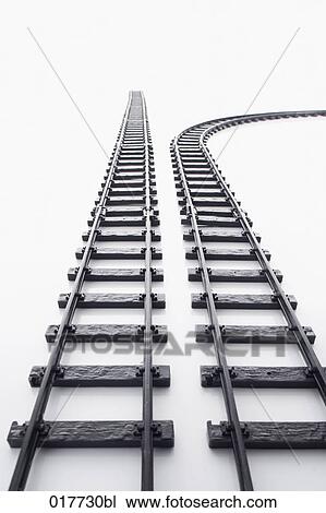 still life of two toy train railway tracks one making bend View Large Photo Image Stock Image - still life of two toy train railway tracks one making bend. Fotosearch