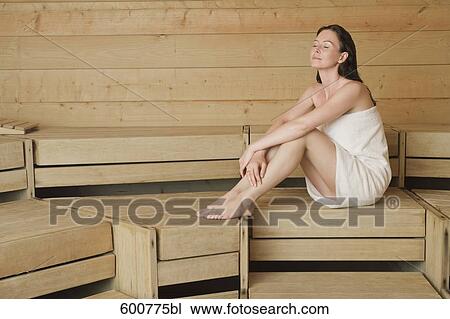woman relaxing in sauna View Large Photo Image Stock Image - woman relaxing in sauna. Fotosearch