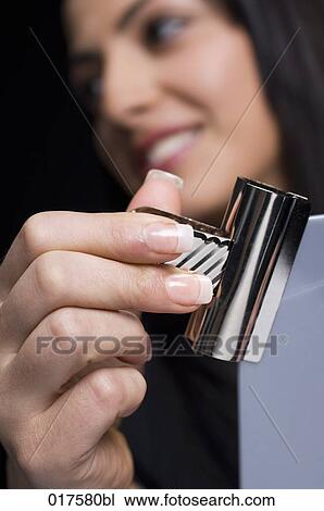 young businesswoman filing document View Large Photo Image Stock Image - young businesswoman filing document. Fotosearch