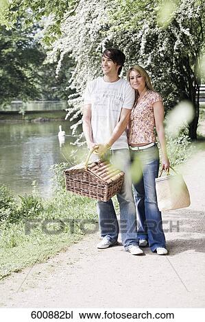 young couple in park View Large Photo Image Stock Image - young couple in park. Fotosearch