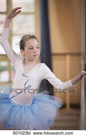 young dancer exercising at ballet barre View Large Photo Image Stock Image - young dancer exercising at ballet barre. Fotosearch