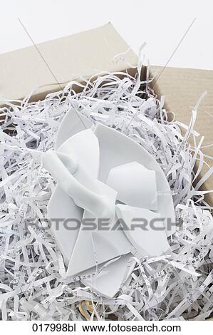 close-up of broken crockery coming out of cardboard box View Large Photo Image Stock Image - close-up of broken crockery coming out of cardboard box. Fotosearch