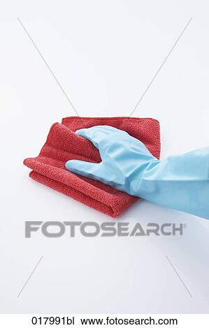 hand in rubber glove cleaning with red cloth View Large Photo Image Stock Image - hand in rubber glove cleaning with red cloth. Fotosearch