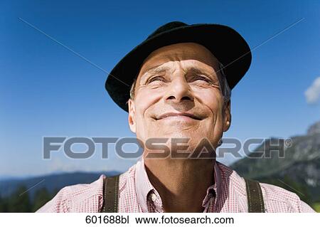 headshot of mature man wearing hat in the mountains View Large Photo Image Stock Image - headshot of mature man wearing hat in the mountains. Fotosearch