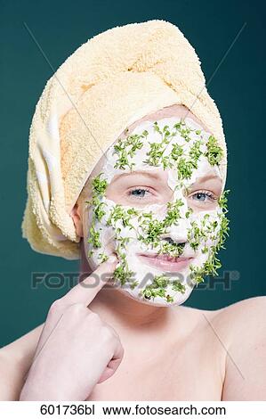 headshot of young woman with face mask View Large Photo Image Stock Image - headshot of young woman with face mask. Fotosearch
