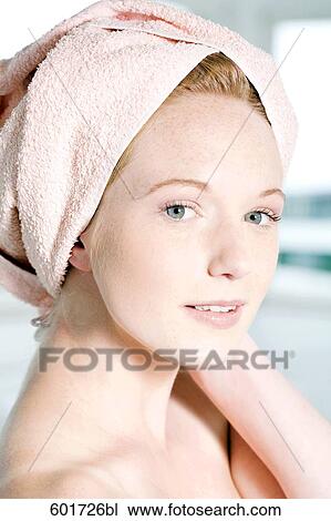 headshot of young woman with towel on her head View Large Photo Image Stock Image - headshot of young woman with towel on her head. Fotosearch