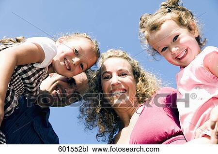 low angle portrait of family with two children View Large Photo Image Stock Image - low angle portrait of family with two children. Fotosearch