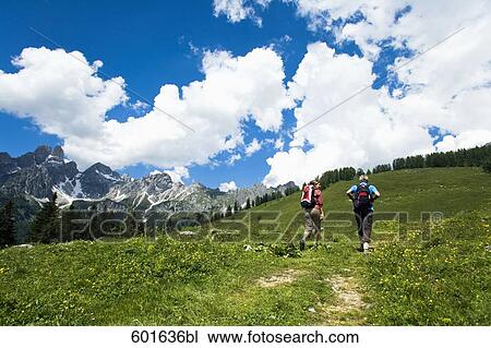 mature couple hiking in the mountains View Large Photo Image Stock Image - mature couple hiking in the mountains. Fotosearch
