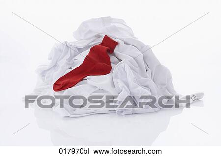 pile of white laundry with one red sock View Large Photo Image Stock Image - pile of white laundry with one red sock. Fotosearch